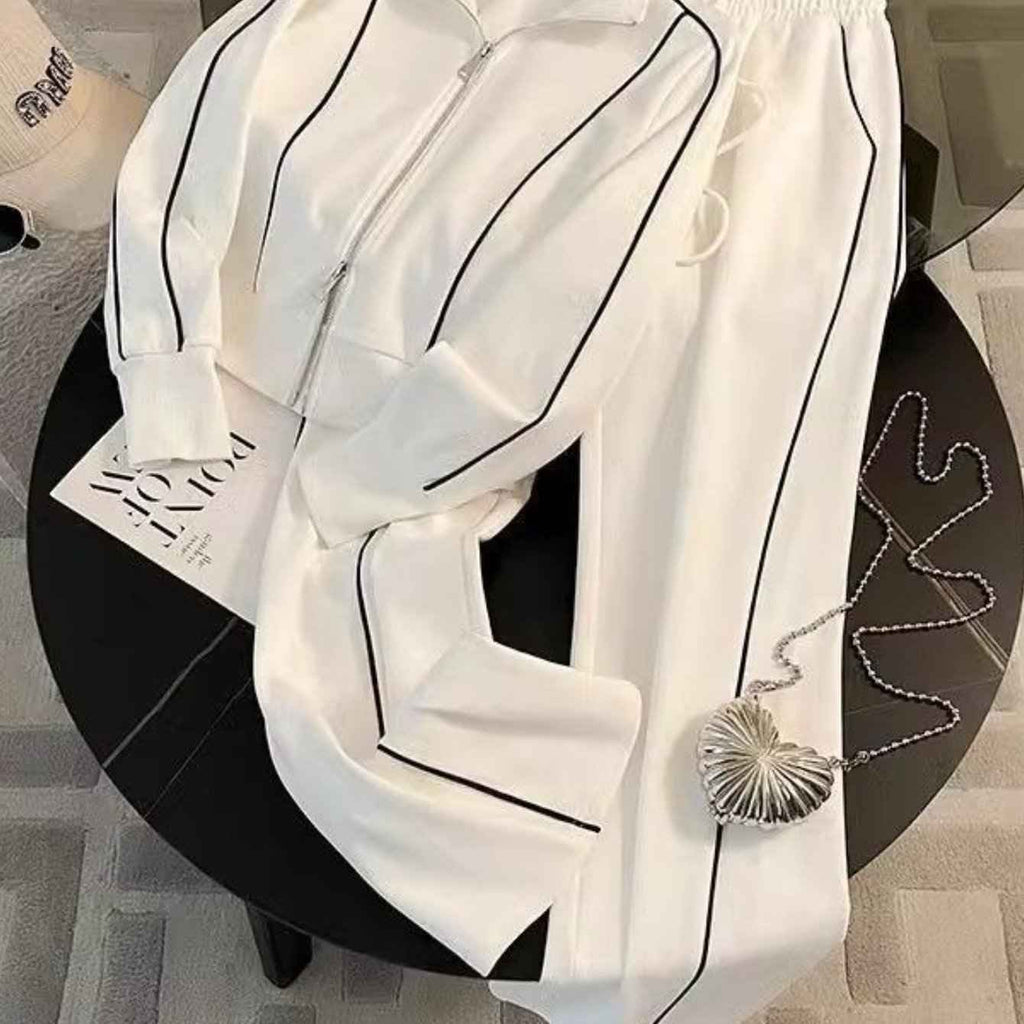 In 2026, it was matched with -padded jacket suit, street bombing leisure s suit, and Women's spring and autumn fashion age-reducing cardigan, zipper sweater and wide-leg pants.